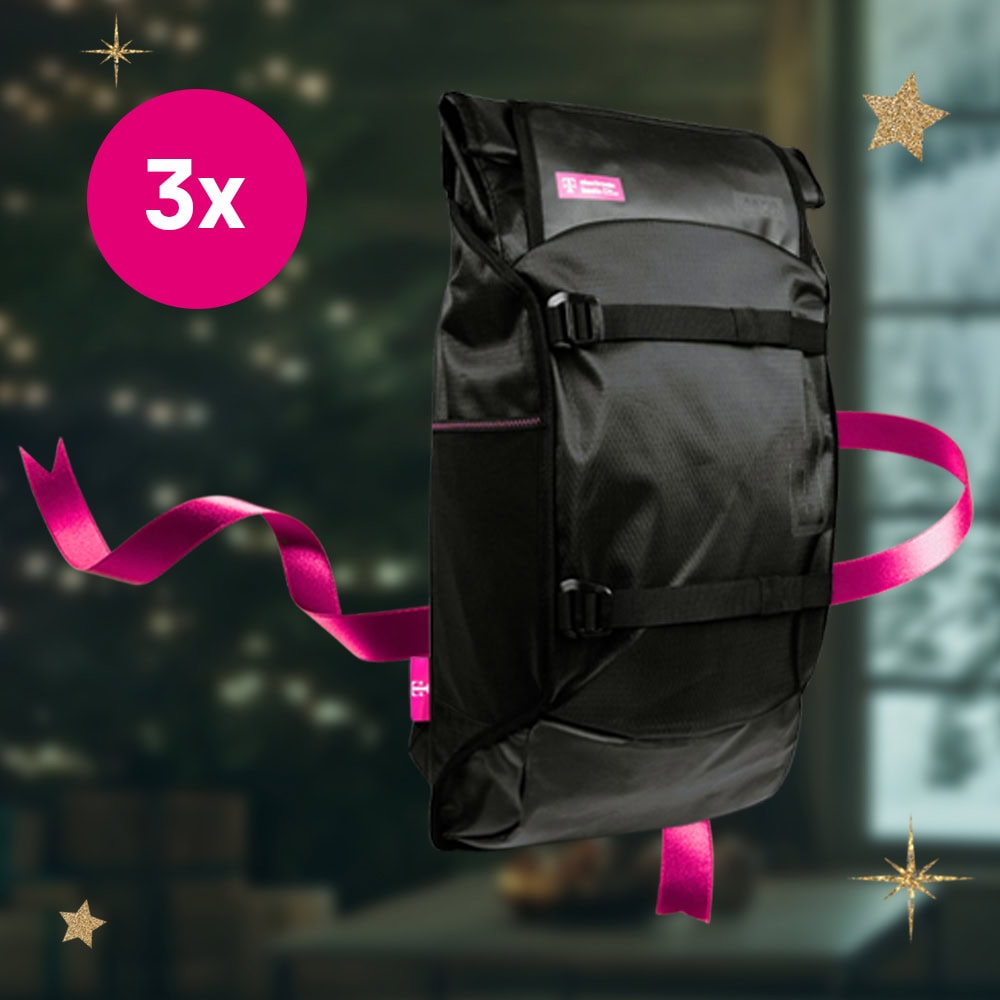 Ein schwarzer Rucksack mit Magenta-Akzenten aus der LOVE MAGENTA Fahrradzubehör-Linie ist mit festlichem Dekor abgebildet; ein Magenta-Kreis zeigt 3x.