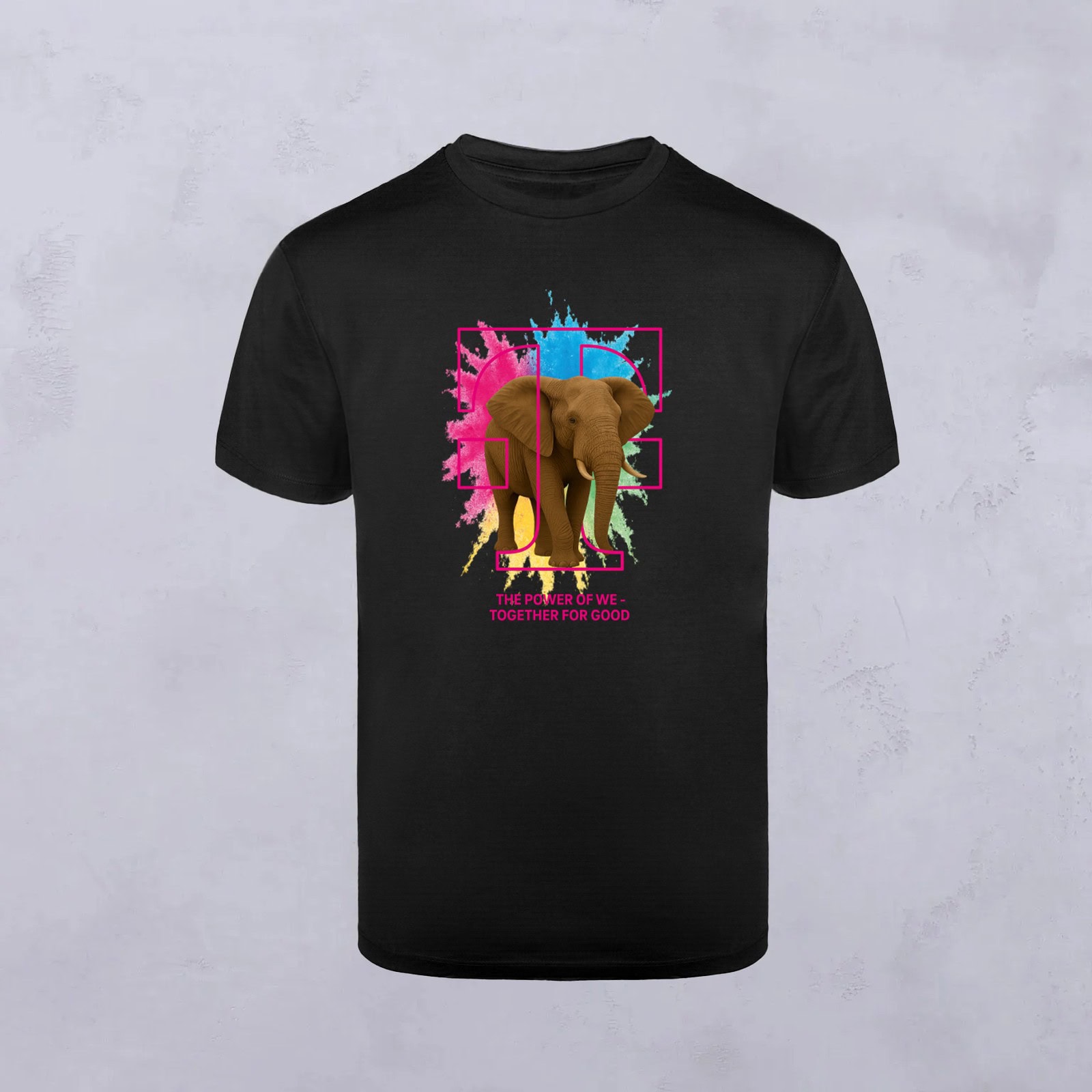 Schwarzes T-Shirt mit Ihrem Motiv, einer farbenfrohen Grafik eines Elefanten und dynamischen Farbspritzern in Rosa, Blau und Gelb sowie dem Schriftzug „THE POWER OF WE – TOGETHER FOR GOOD“ unterhalb des Bildes.